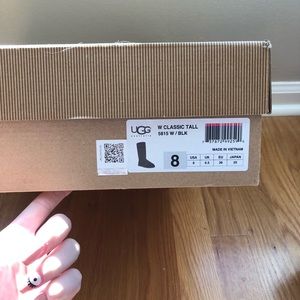 Brand new tall black UGGS